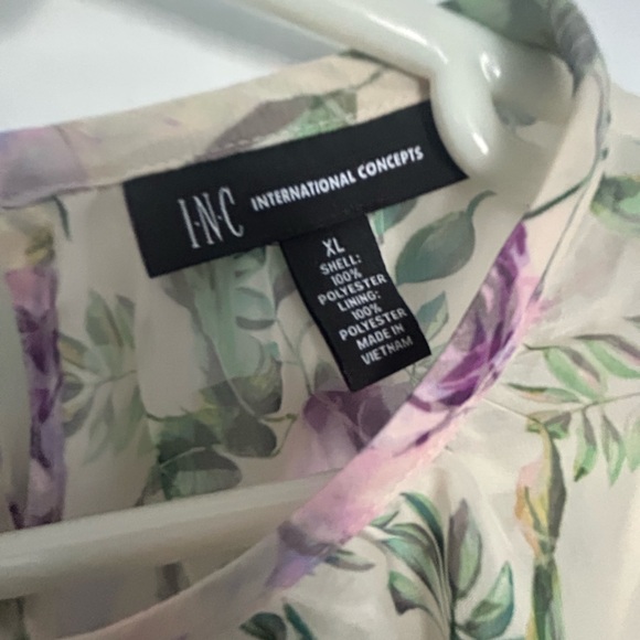 Floral short sleeve blouse, sheer with attached under shell. Never worn. - Picture 7 of 9